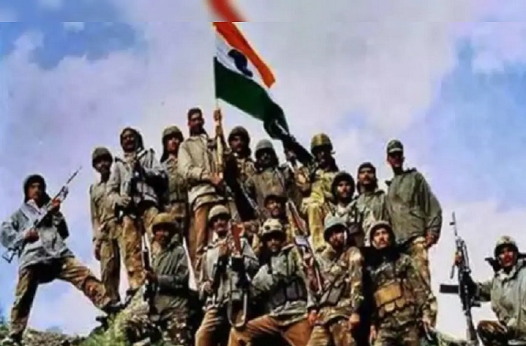 indian soldiers celebrating victory on a peak during the kargil war.