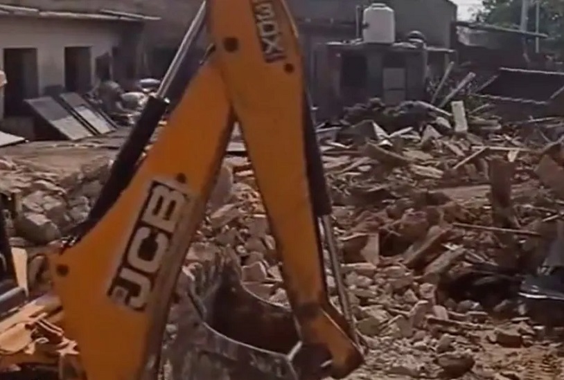 bulldozer action on illegal construction